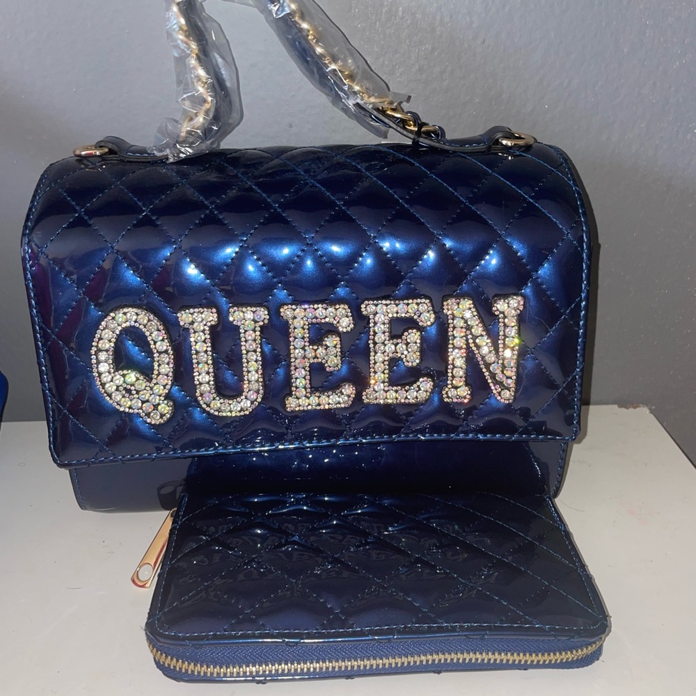 BRAND NEW BLUE HAND BAG WITH MATCHING WALLET!